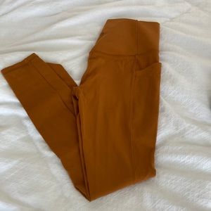 Athleta orange yoga pants